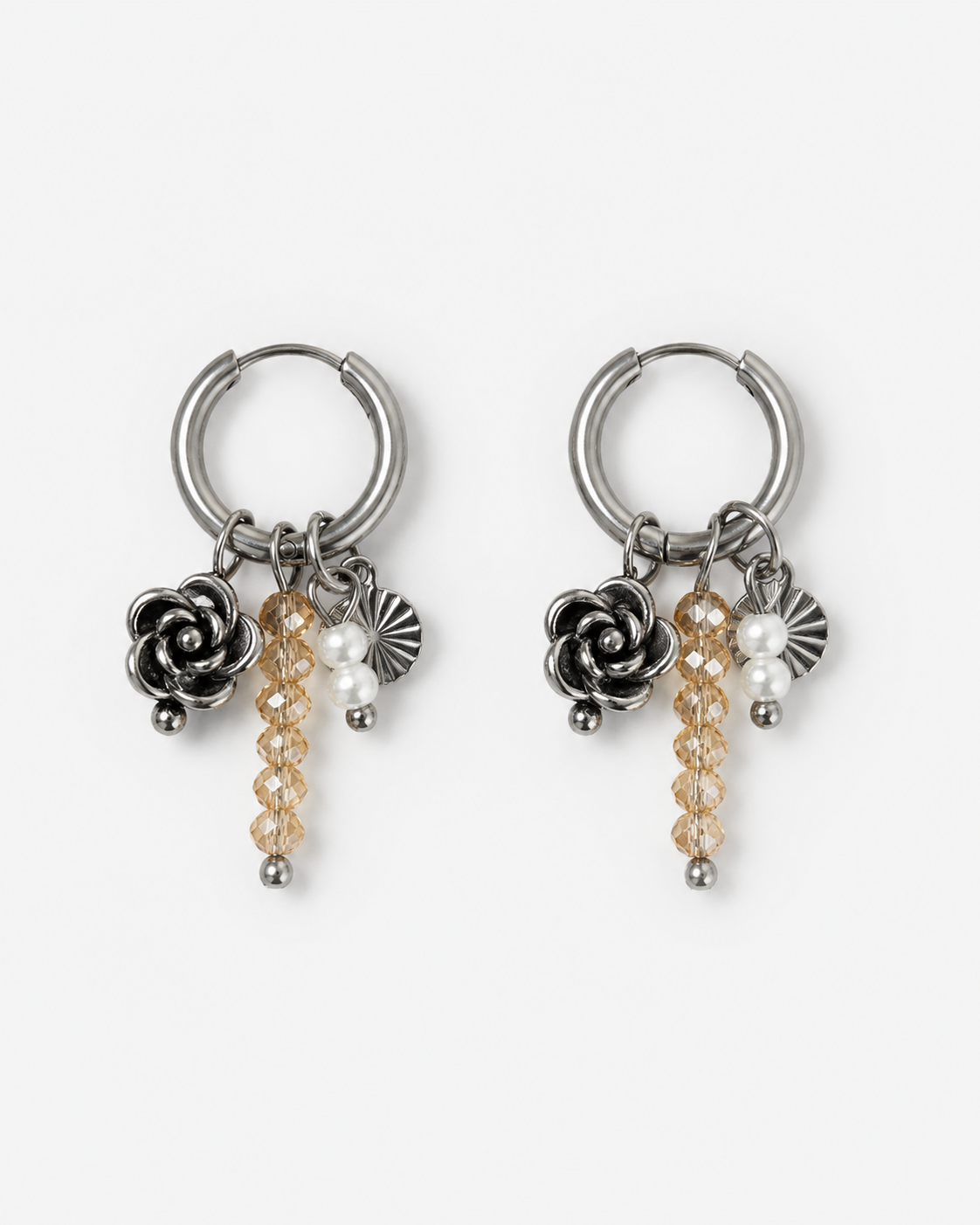 Handmade zilveren RVS oorbellen met roosje en champagne kralen